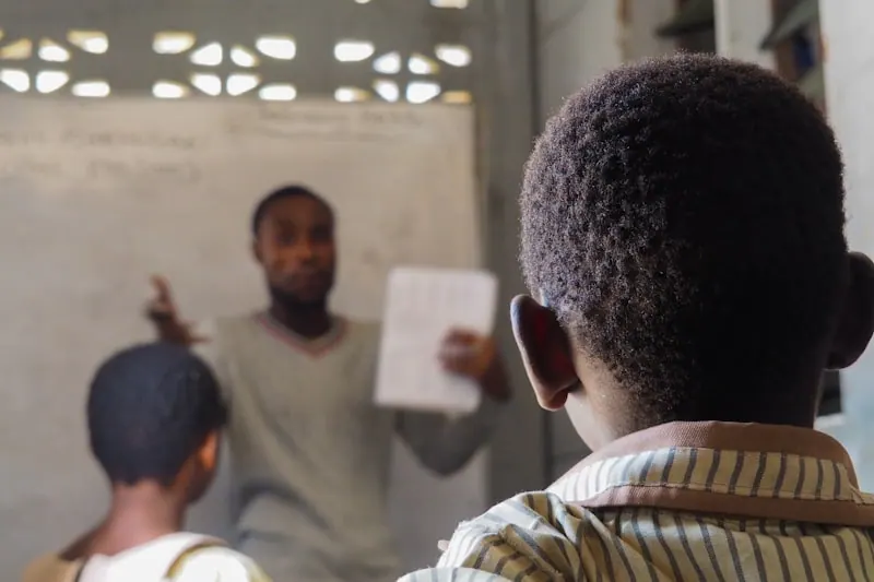Teacher instructing students in a classroom in Accra, Ghana